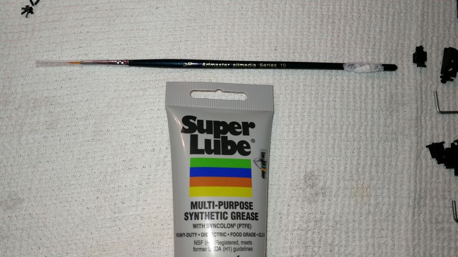 Superlube + paintbrush